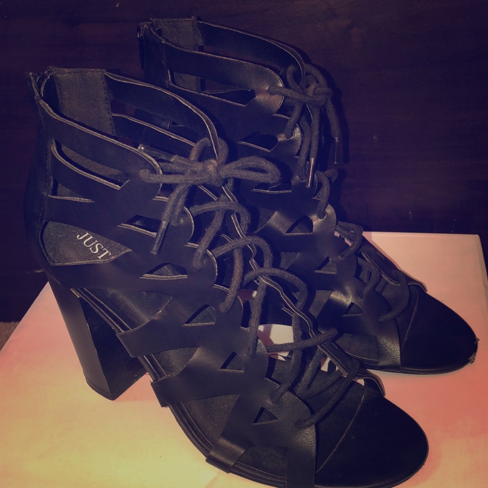 Black lace up chunky heels.